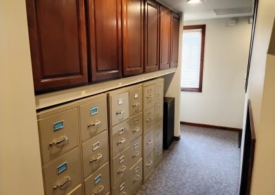 Hallway with abundant built-in storage at first-floor Marlton office condo for sale on Route 73, New Jersey